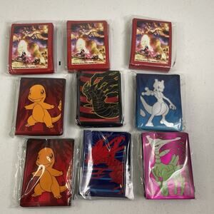 Pokemon Sleeves New & Open Box Charizard Charmander Mewtwo Giratina Iron Leaves